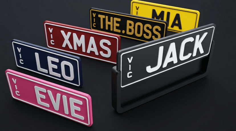 Custom JACK plate in a sheath holder surrounded by colourful swappable plates including EVIE, LEO, MIA, XMAS, and THE BOSS